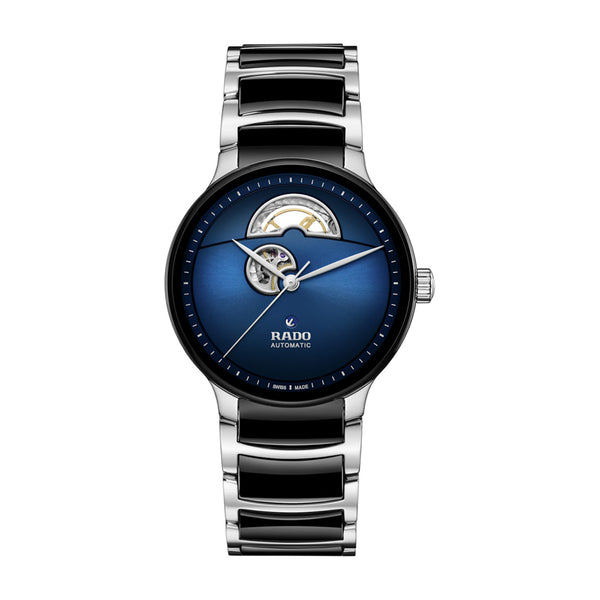 Watch with blue face and silver case on a white background