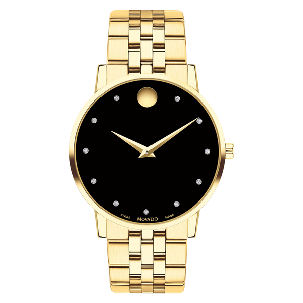 Gold wristwatch with black face on a white background