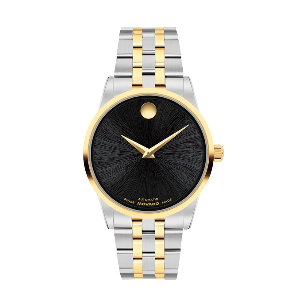 Watch with two-tone metal strap on a white background