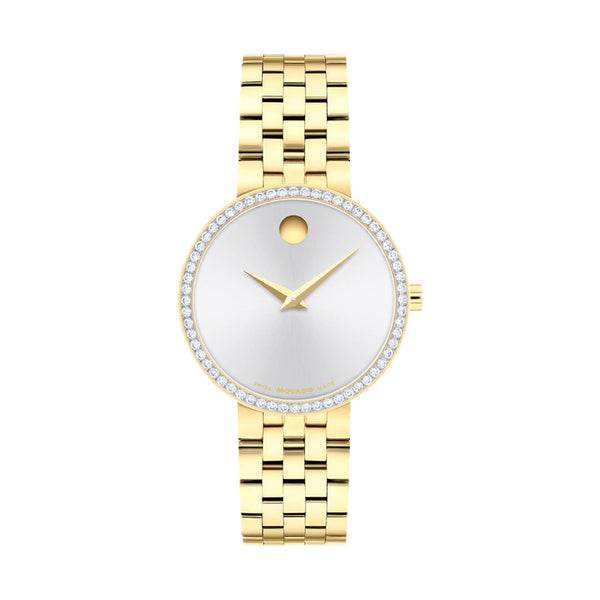 Gold watch with a white face on a white background