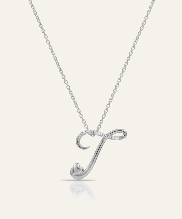 Silver necklace with a letter 'J' pendant on a white background