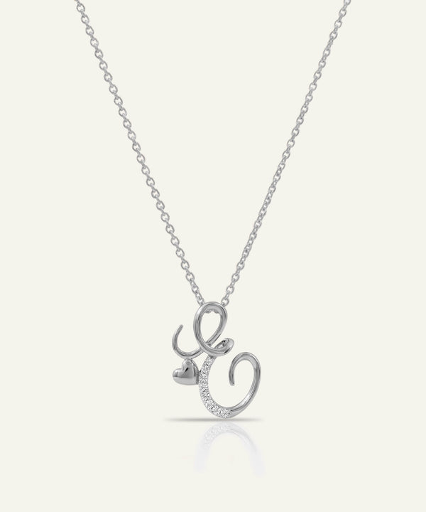 Silver necklace with a unique pendant on a white background