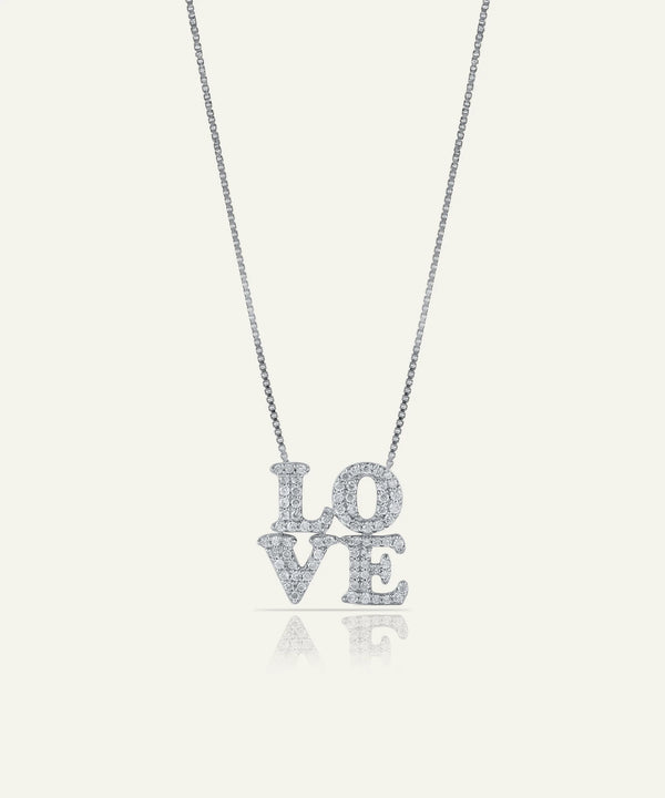 Silver 'LOVE' necklace on a white background