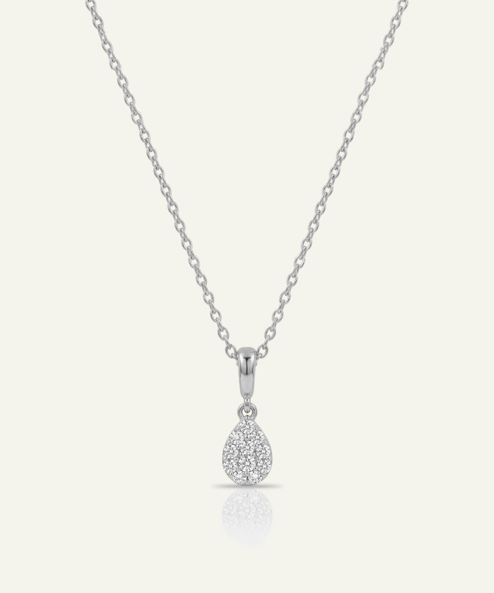 Silver teardrop pendant necklace on a white background