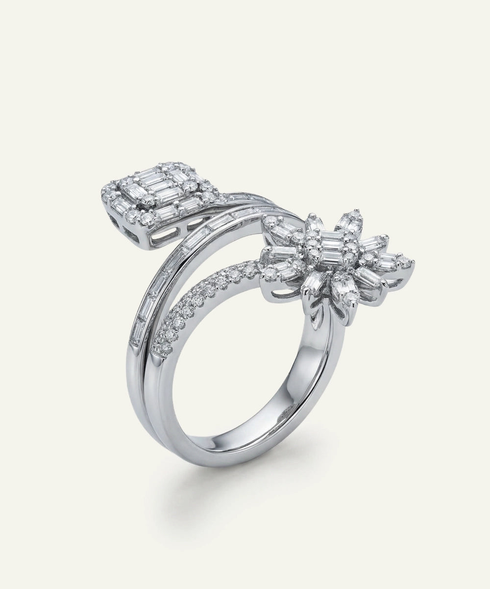 Diamond ring with floral design on a white background
