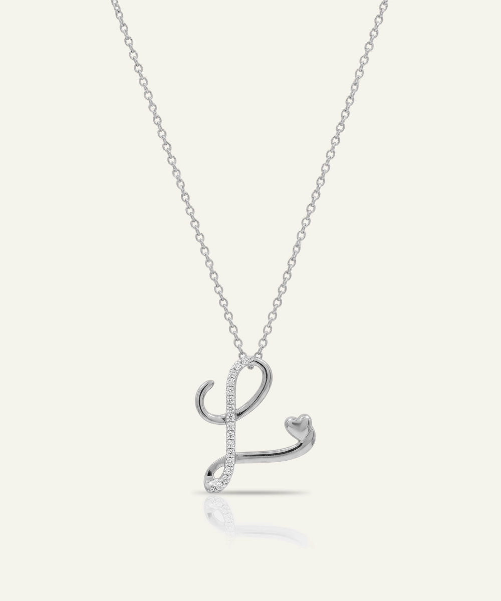 Silver necklace with a letter 'L' pendant on a white background