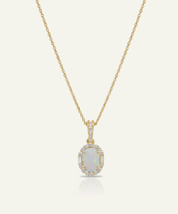Gold necklace with a pendant on a white background