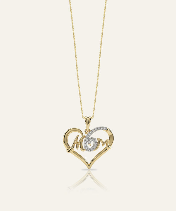 Gold necklace with a heart-shaped pendant featuring the word 'MOM'.