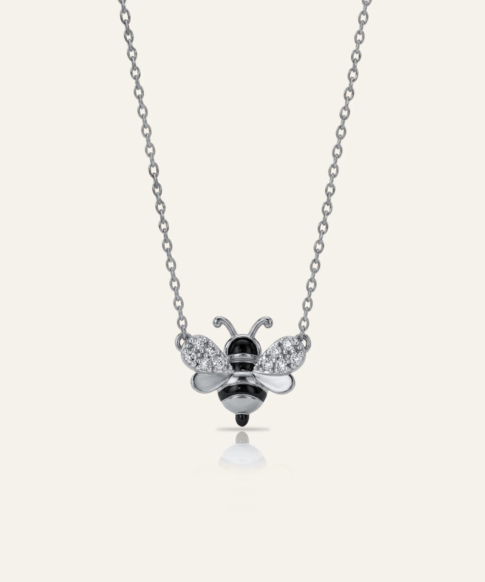 Bee-shaped pendant necklace on a white background