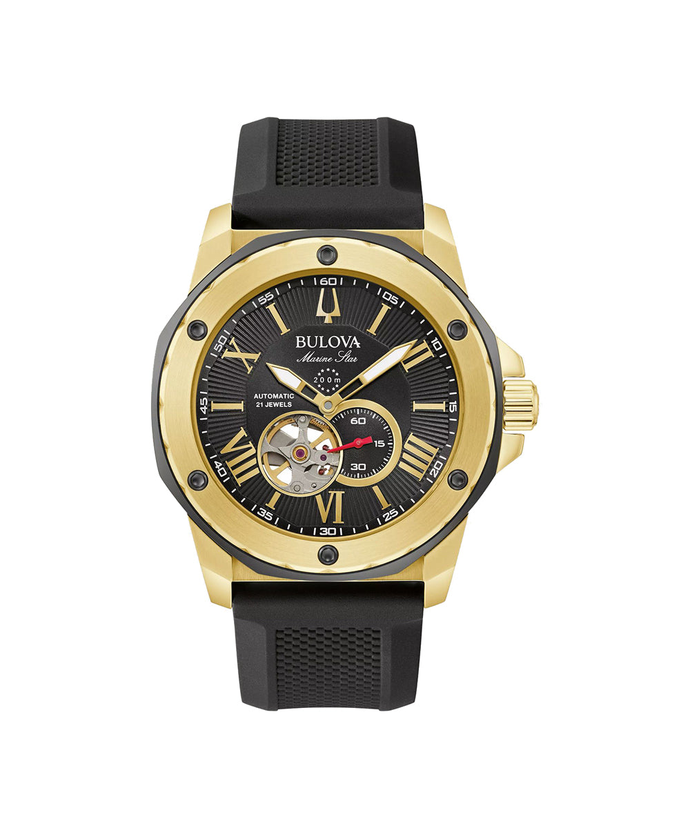 Gold watch with black face and rubber strap on a white background