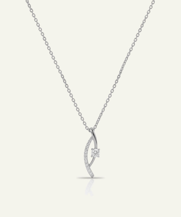 Silver necklace with a delicate pendant on a white background