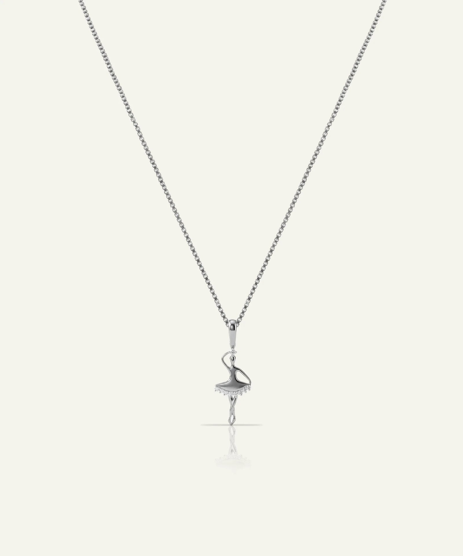 Silver flamingo pendant necklace on a white background