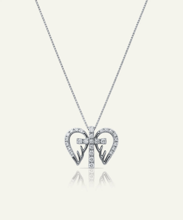 Diamond necklace with a red gemstone on a white background