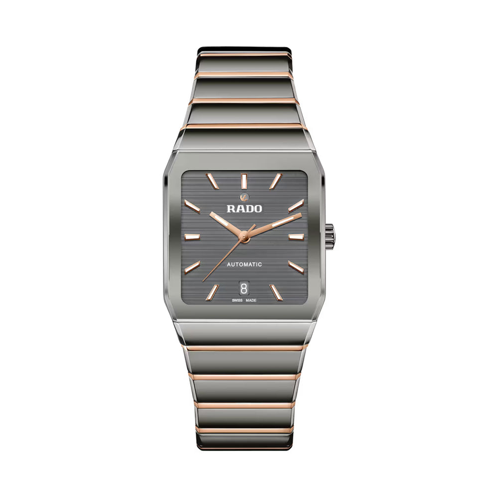 Rado watch with rose gold and silver band on a white background