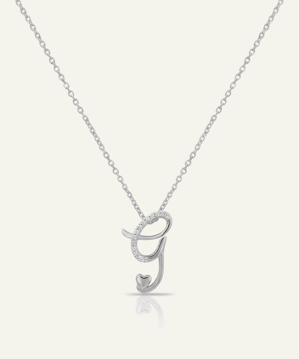 Silver necklace with a letter 'J' pendant on a white background