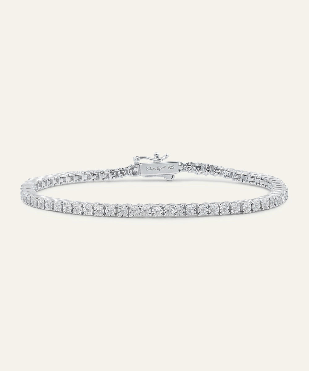 Silver bracelet with diamonds on a white background
