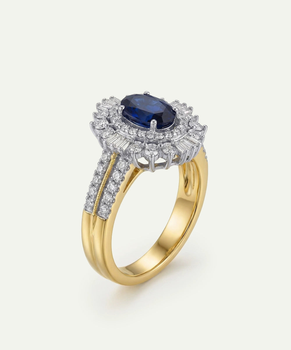 Gold ring with a blue gemstone and diamond accents on a white background