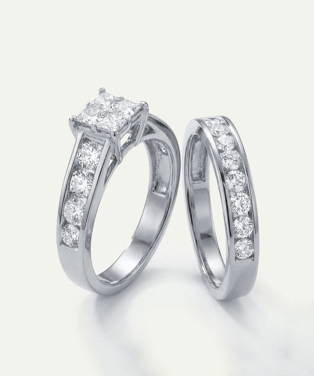 Two diamond rings on a light gray background