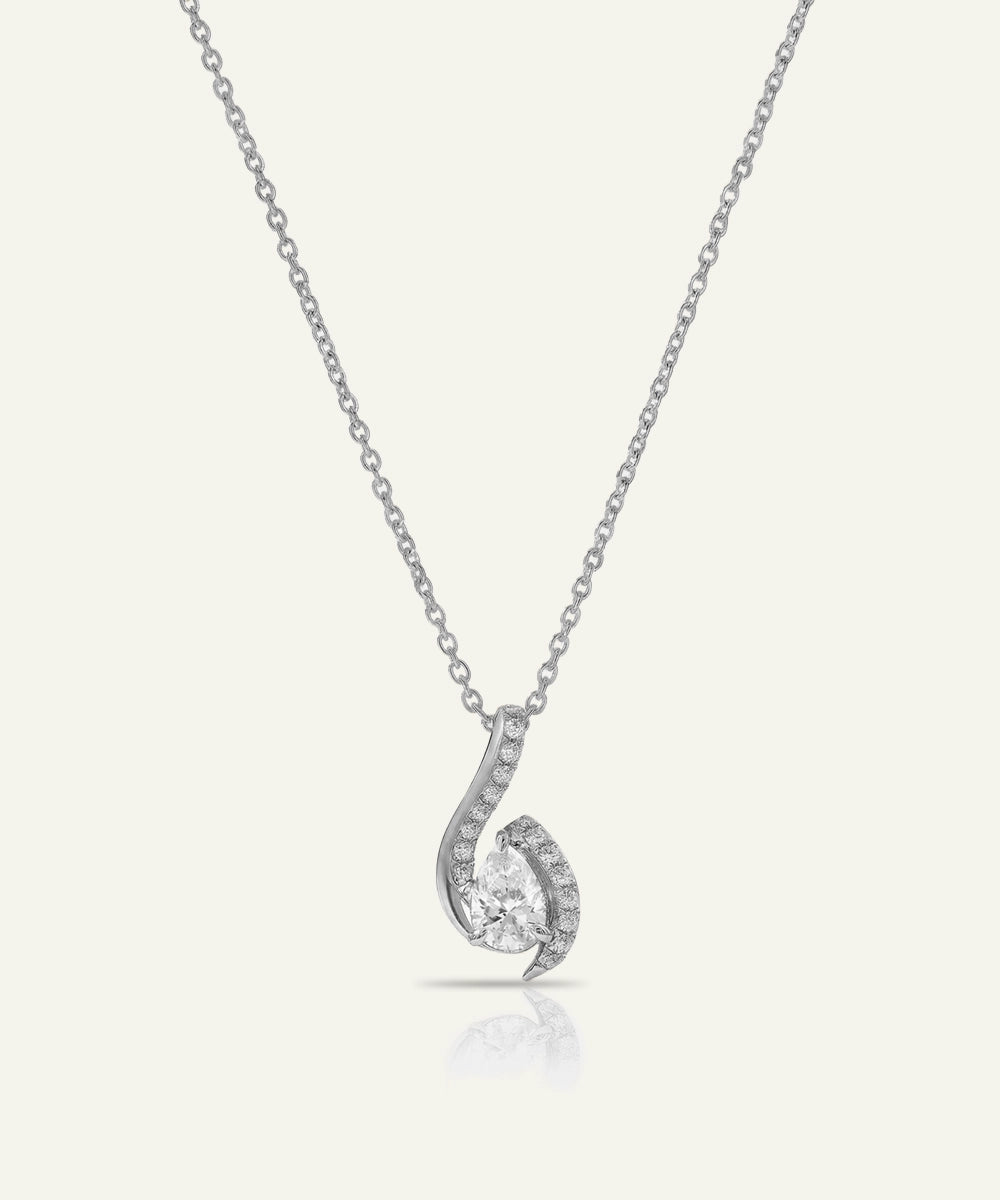 Silver necklace with a unique pendant on a white background