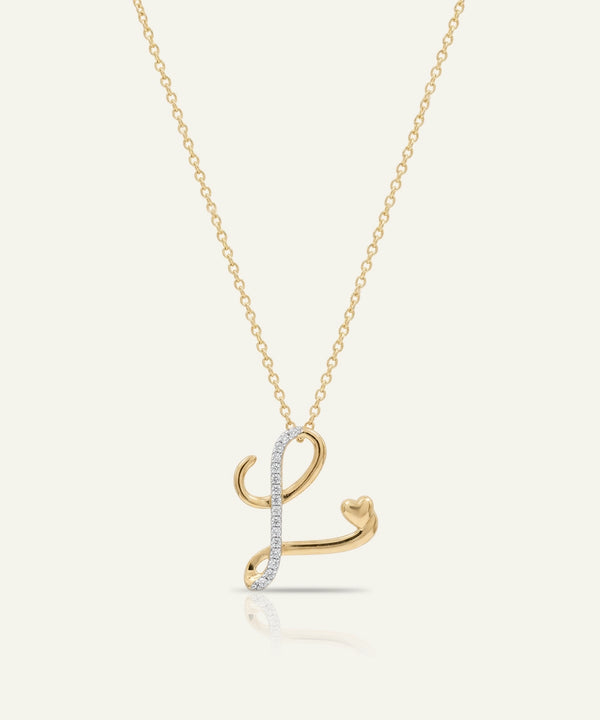 Gold necklace with a letter 'L' pendant on a white background