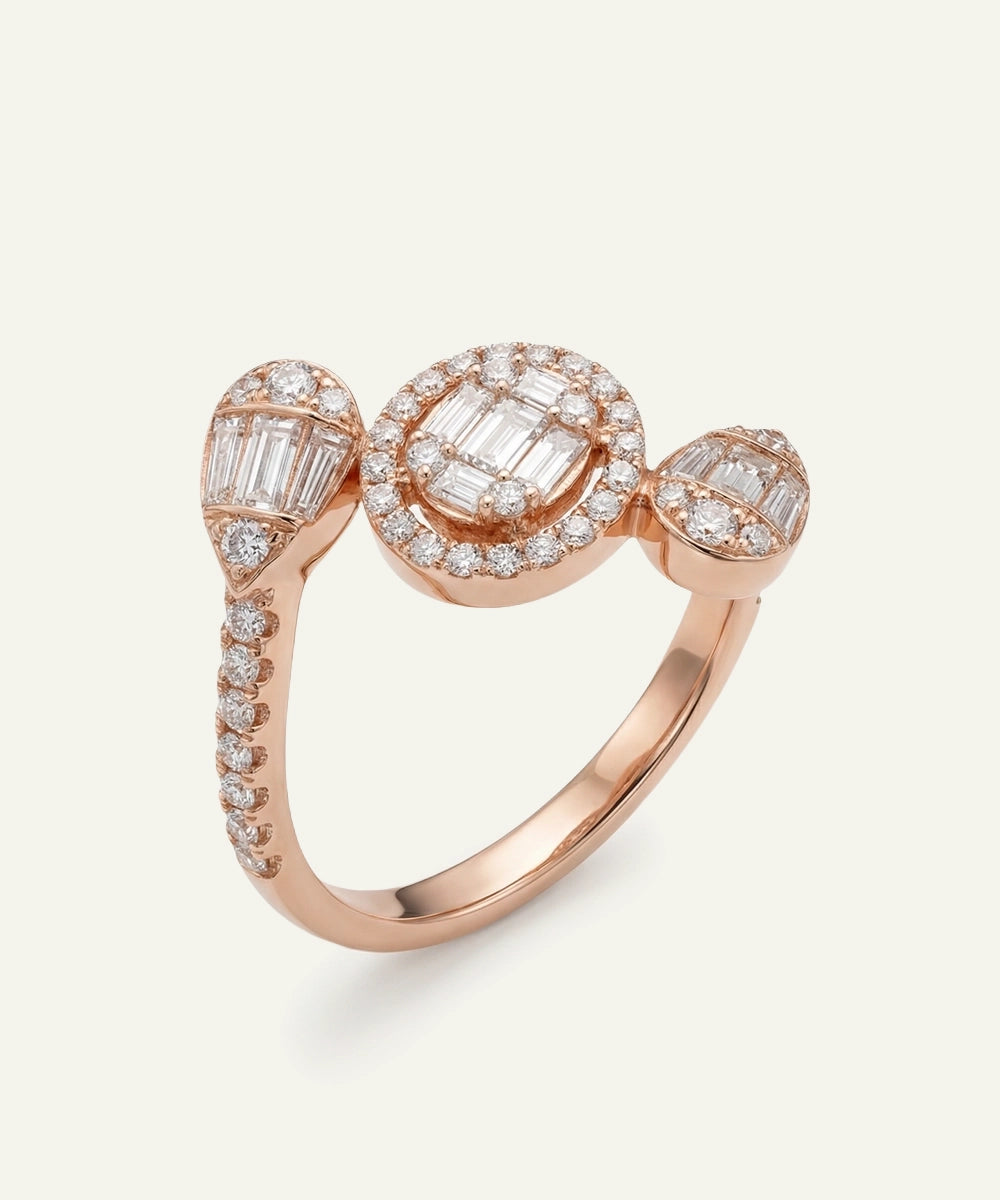Rose gold ring with diamond accents on a light background