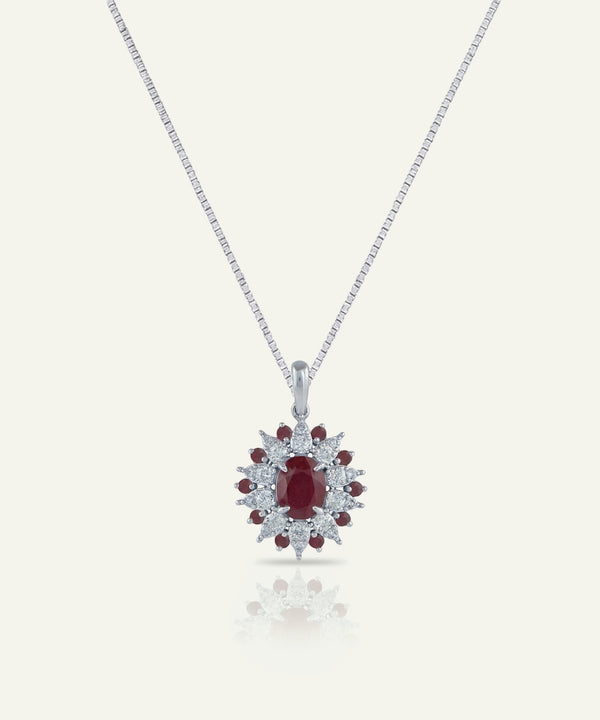 Diamond and ruby pendant on a white background