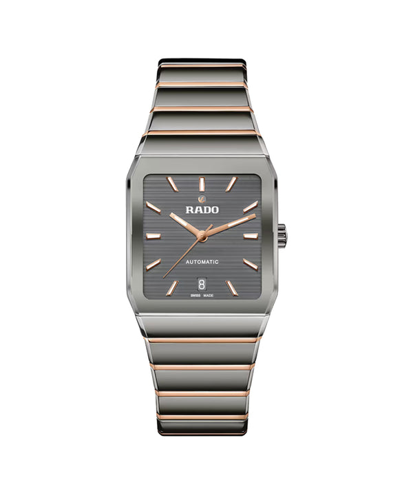 Rado watch with rose gold and silver band on a white background
