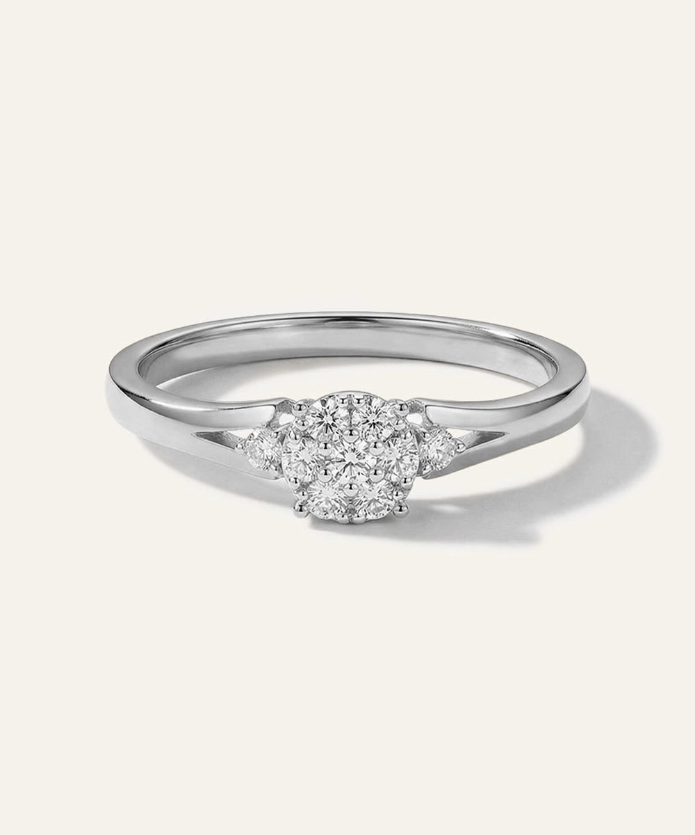 Diamond ring on a light gray background