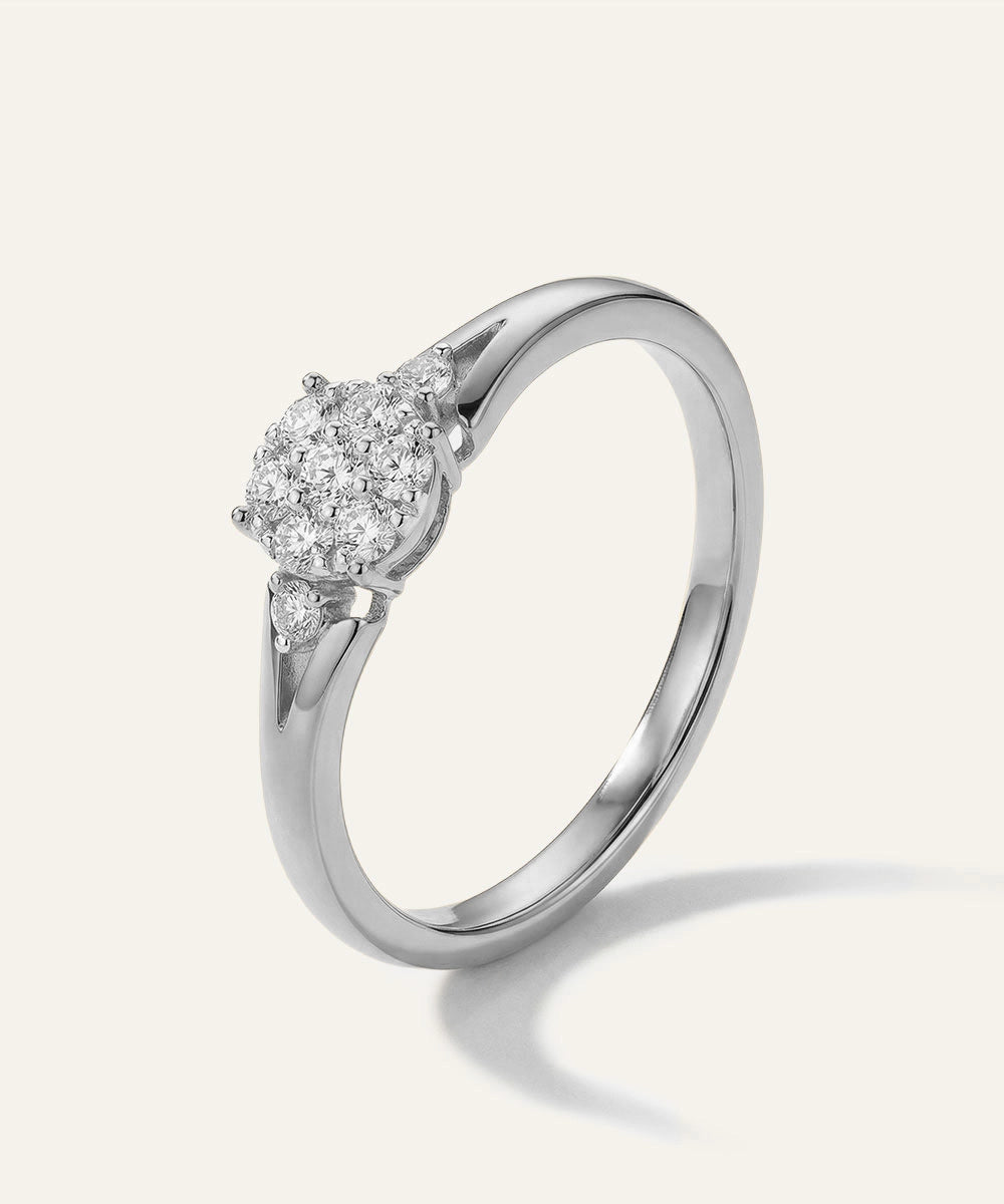 Diamond ring on a light gray background