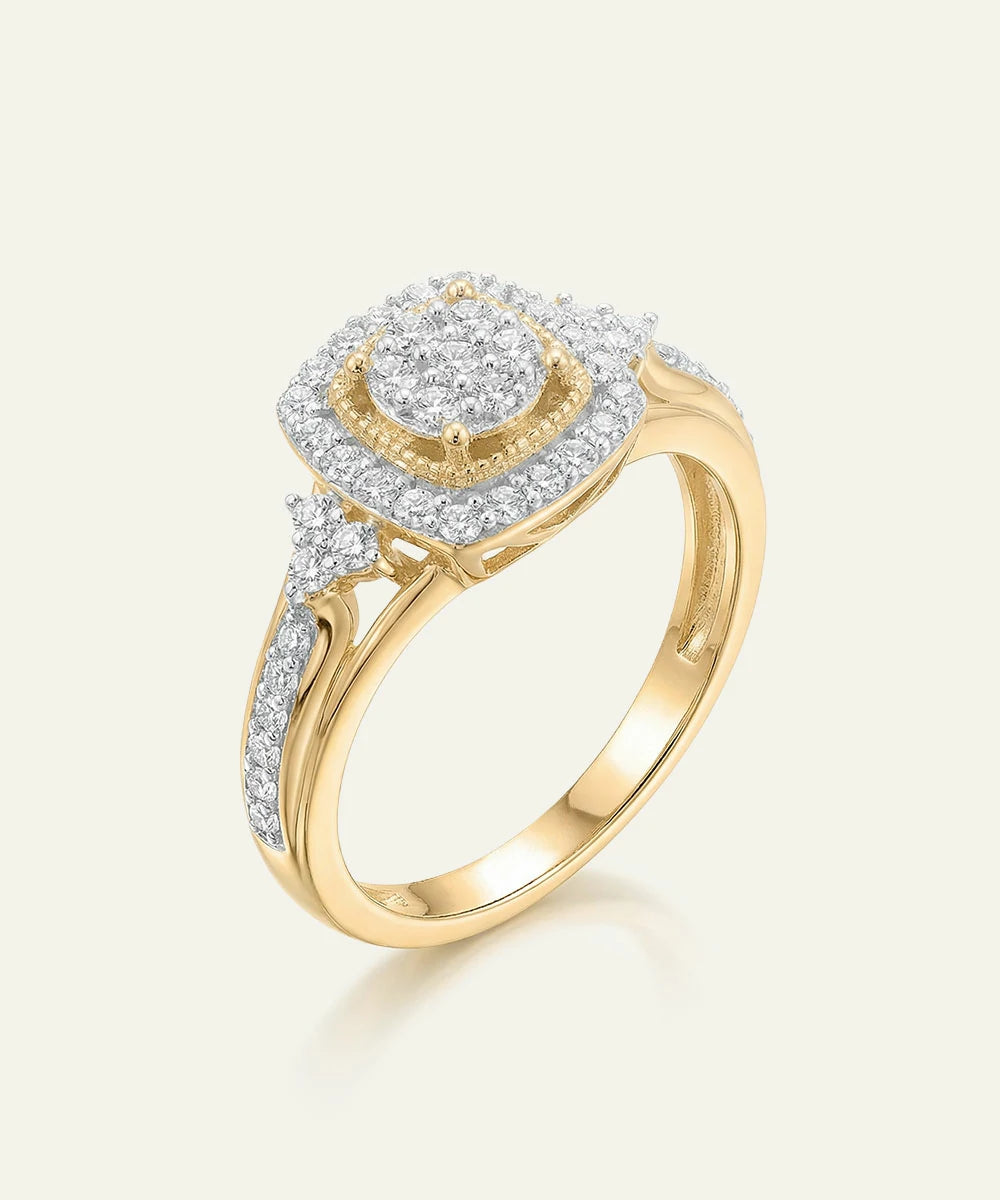 Gold ring with diamond accents on a white background