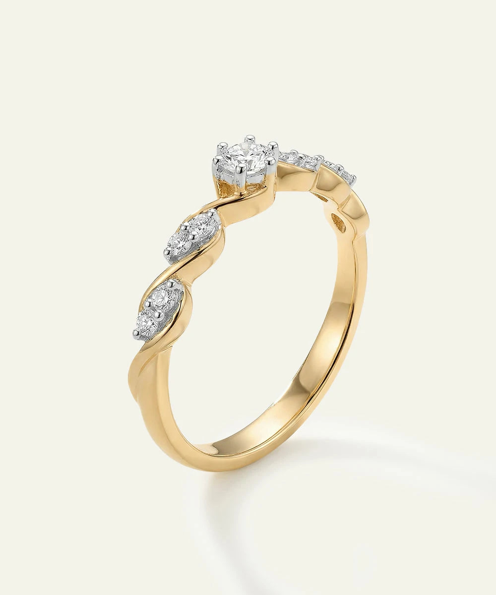 Gold ring with diamonds on a white background