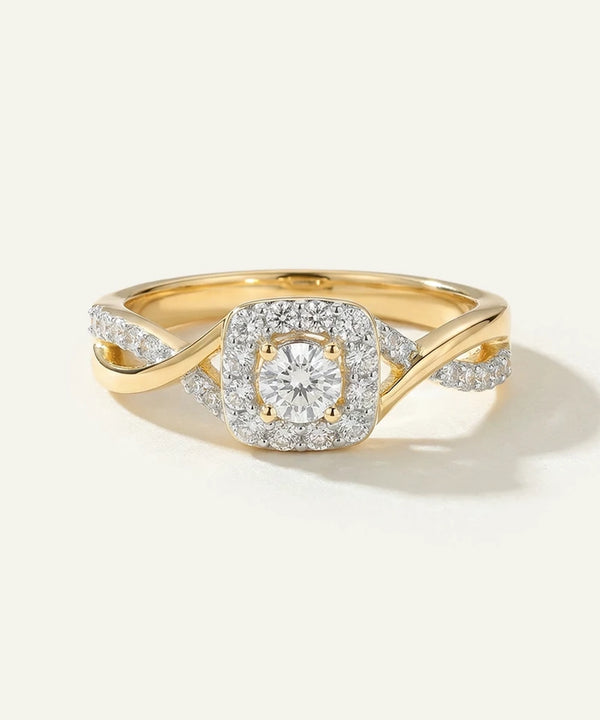 Gold ring with a diamond on a white background