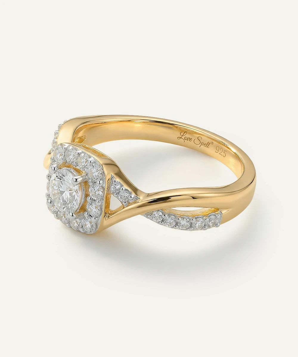 Gold ring with diamond accents on a white background