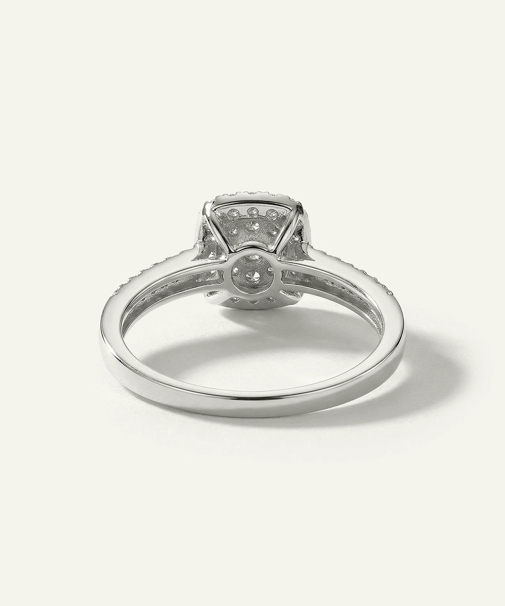 Silver ring with a diamond on a white background