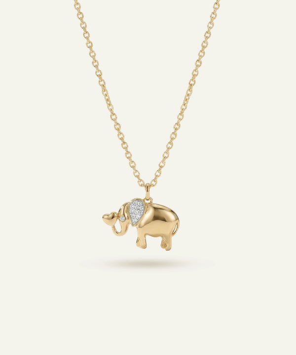 Gold elephant pendant necklace on a white background