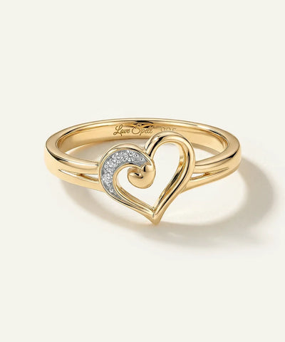 Love Spell collection gold open heart ring with diamond accents on a polished split band.