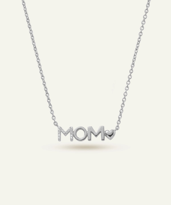 Silver necklace with 'MOM' pendant on a white background