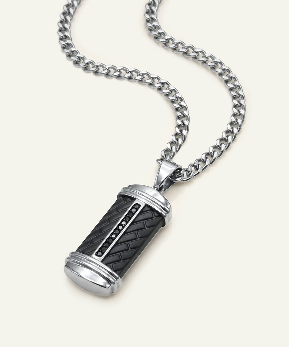 Necklace with a cylindrical pendant on a white background