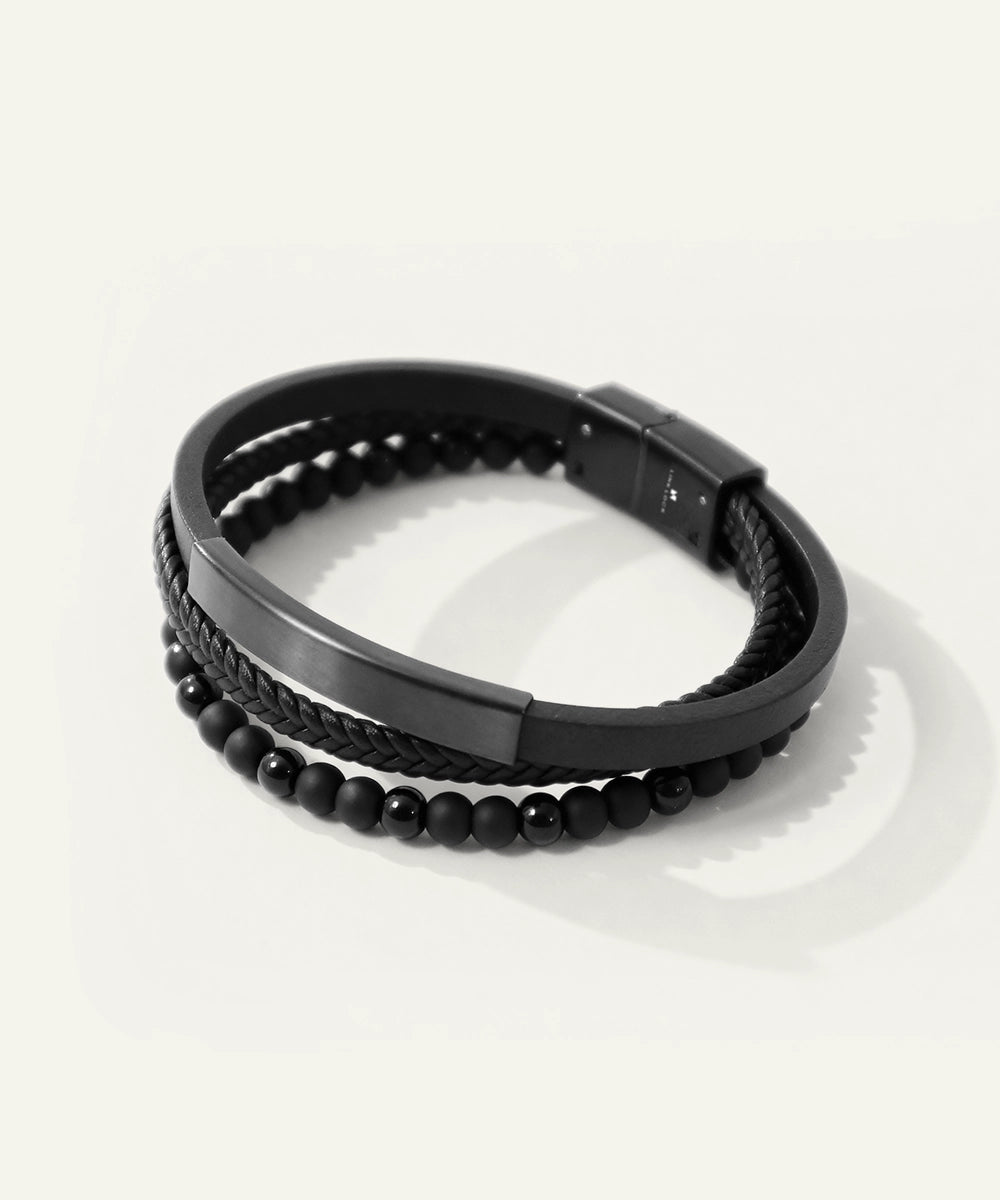 Black beaded bracelet on a white background