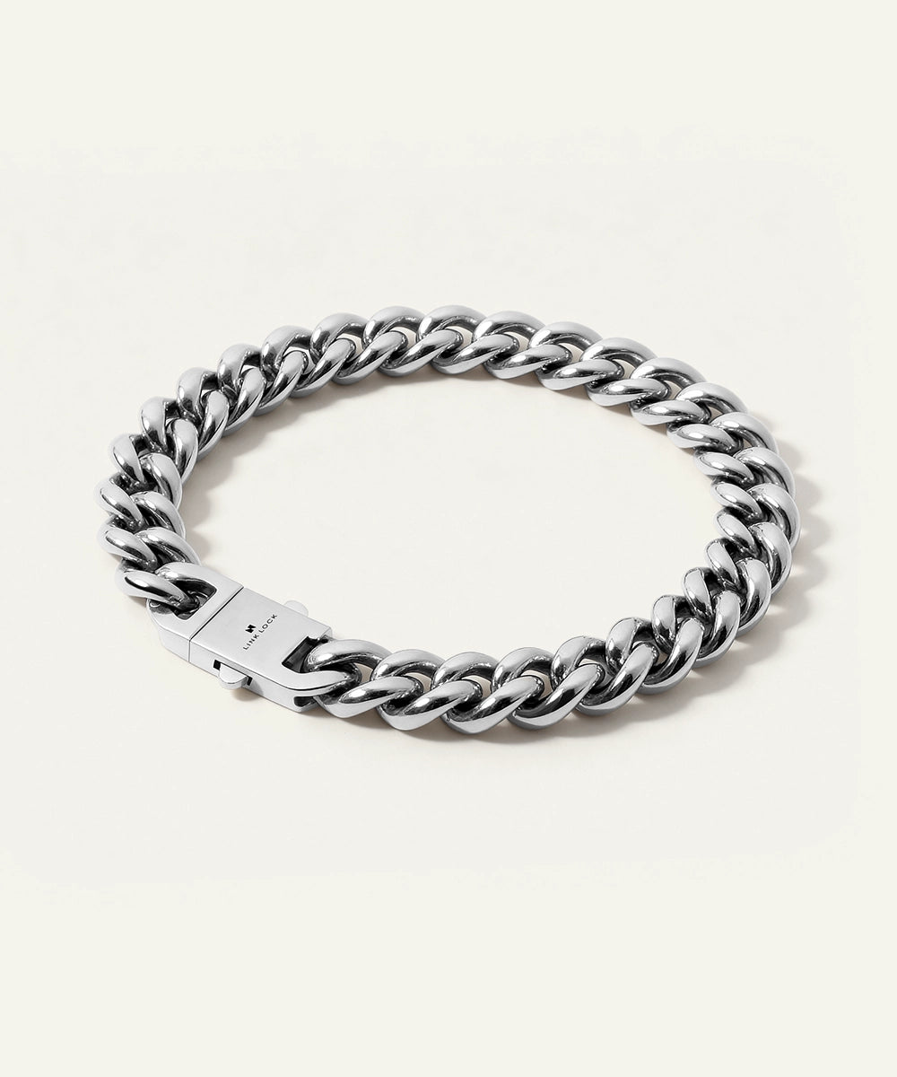 Silver chain bracelet on a white background