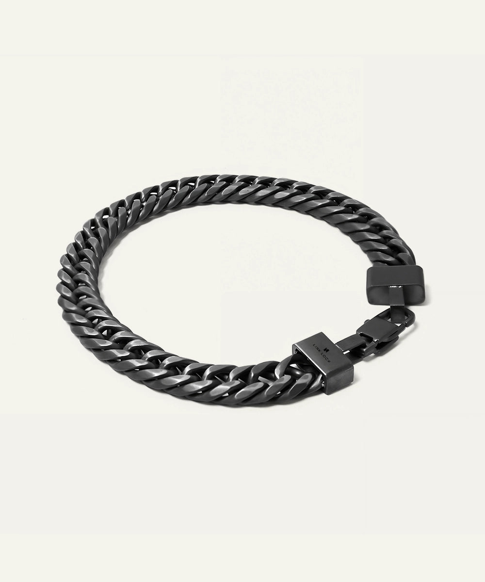 Black chain bracelet on a white background