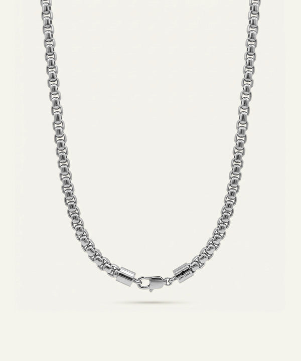 Silver chain necklace on a white background