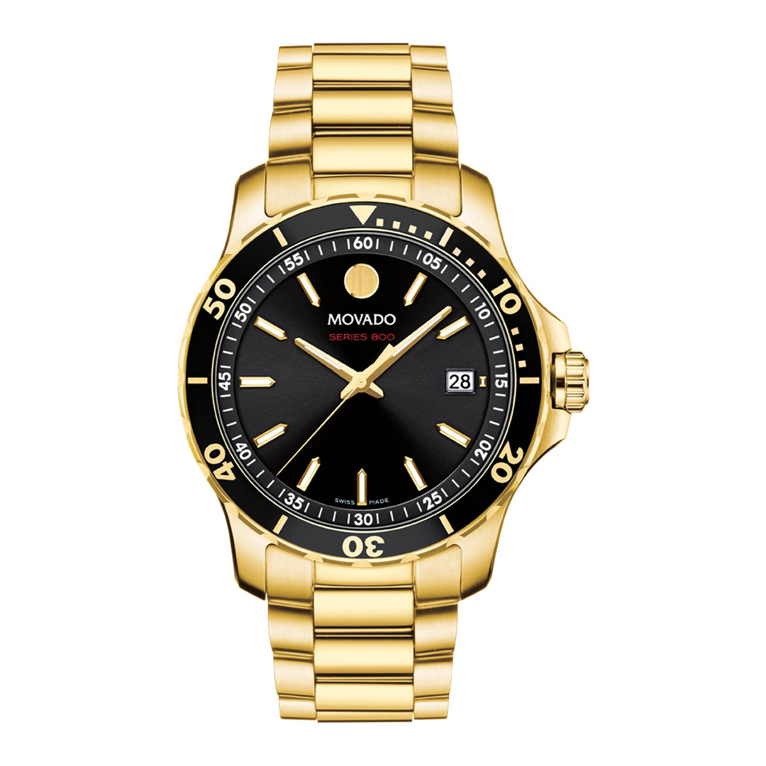 Gold wristwatch with black dial on a white background