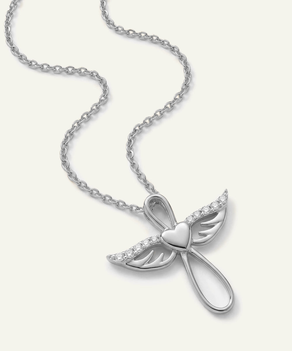 Silver butterfly pendant necklace on a white background