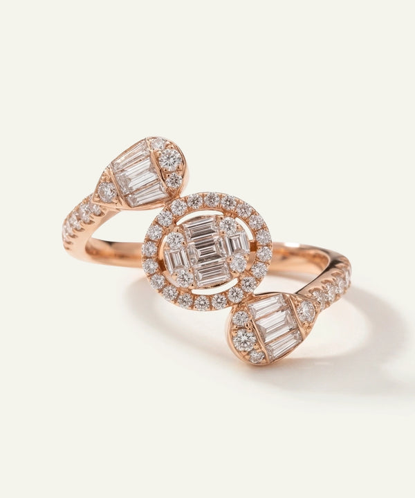 Rose gold ring with diamond accents on a light background
