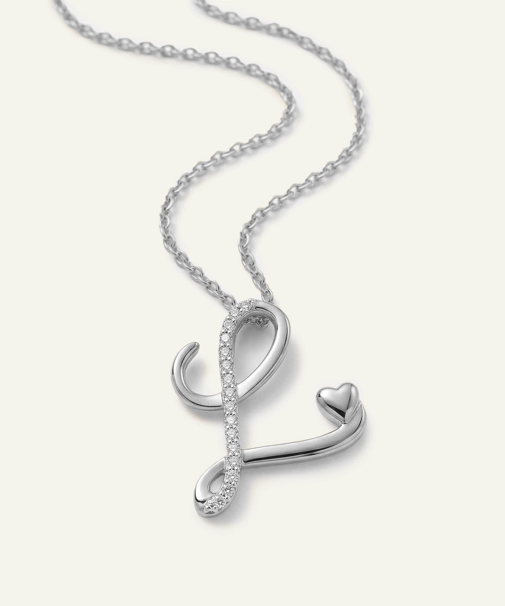 Silver necklace with a unique pendant on a white background