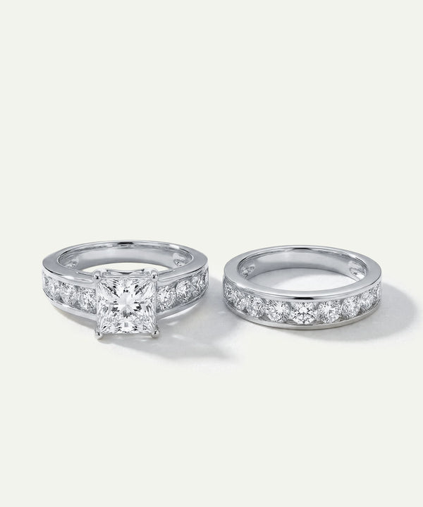 Two diamond rings on a white background