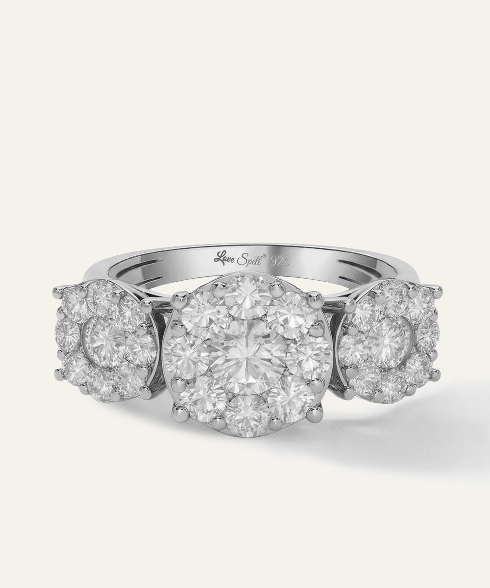 Diamond ring with three round diamonds on a white background