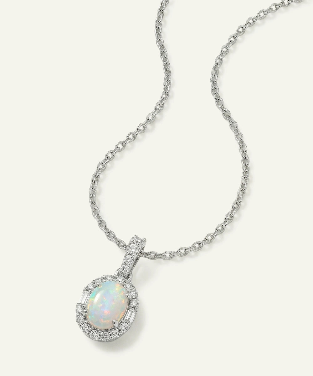 Opal pendant necklace on a white background