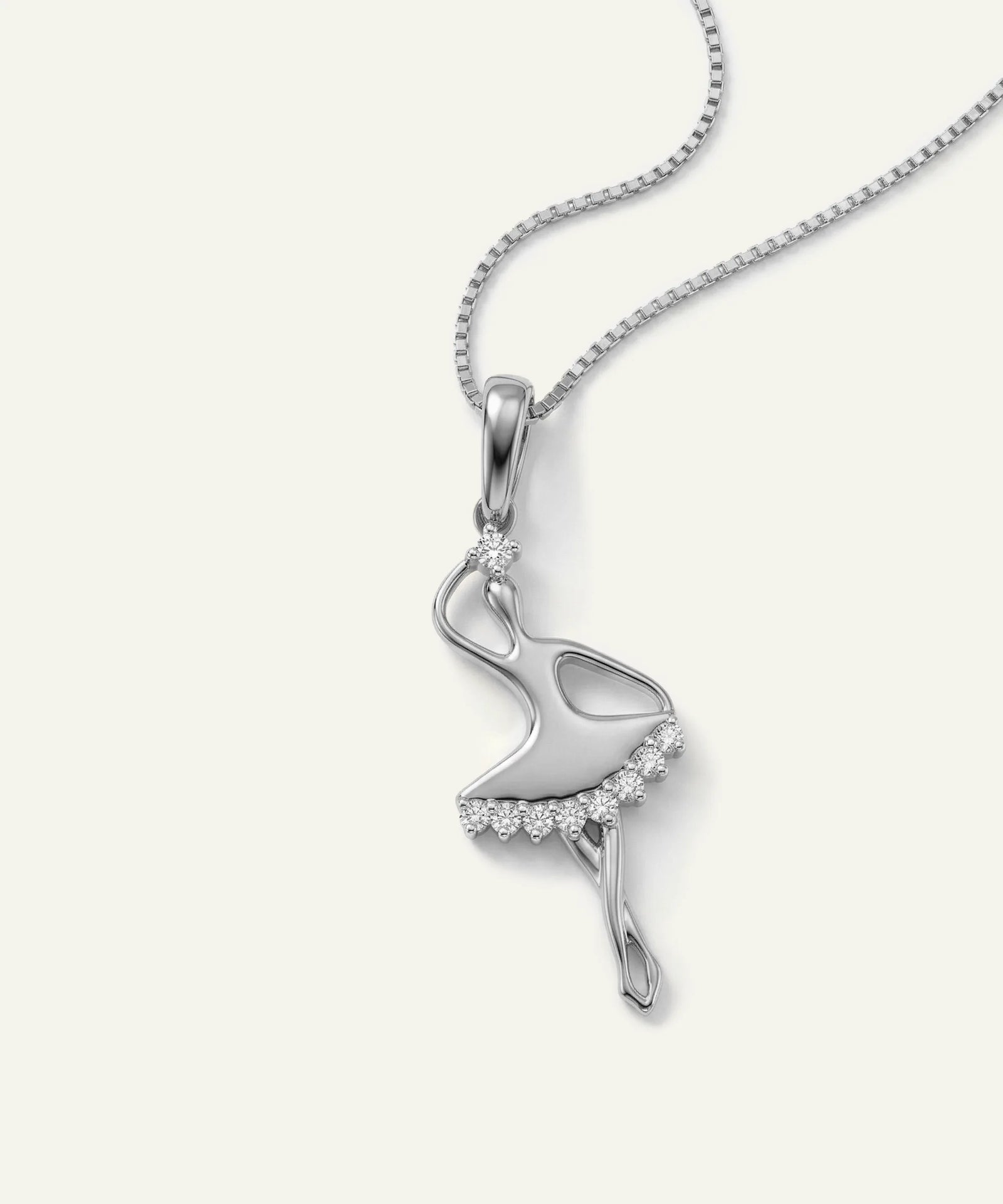 Silver flamingo pendant necklace on a white background